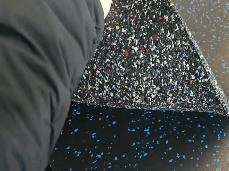 Rolls of high-density dance-grade rubber flooring